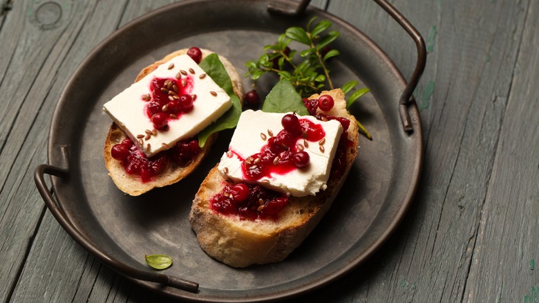 Bruschetta with cheese and cranberry