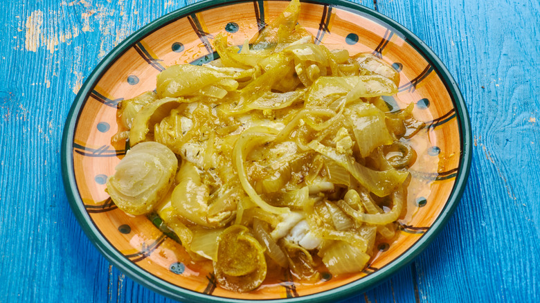 Plate of South African pickled fish with curried onions