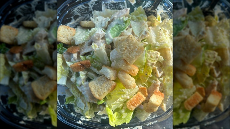 Close-up of a Caesar salad from Buc-ee's in a plastic container