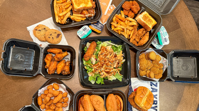 Selection of Zaxby's menu items in black takeout containers