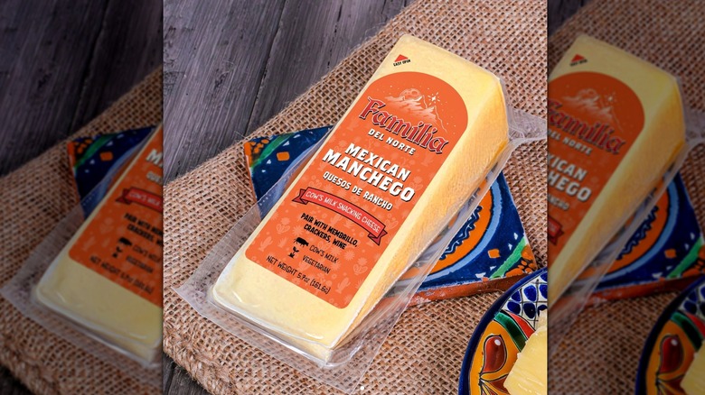 A yellow package of plastic-wrapped cheese
