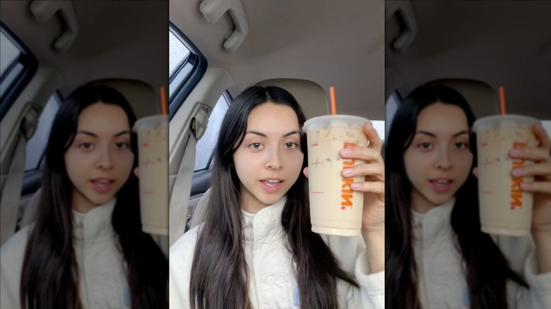 Person holding Vanilla Blueberry Iced Latte