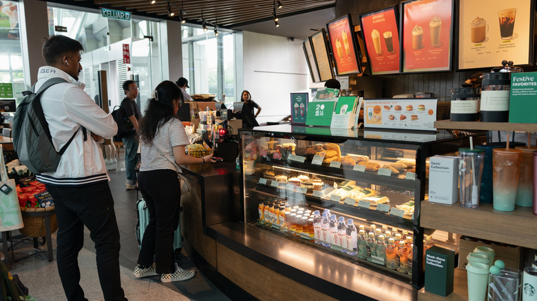 People in line at Starbucks