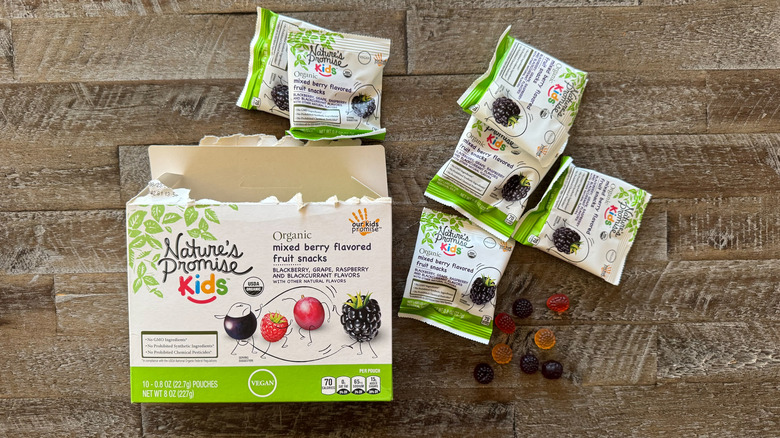 Nature's Promise Organic fruit snacks on wooden table