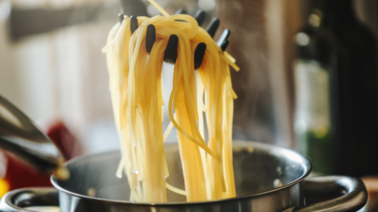 Fresh pasta being boiled