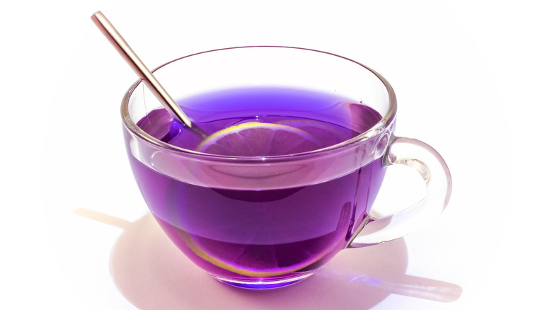 Purple tea in glass cup