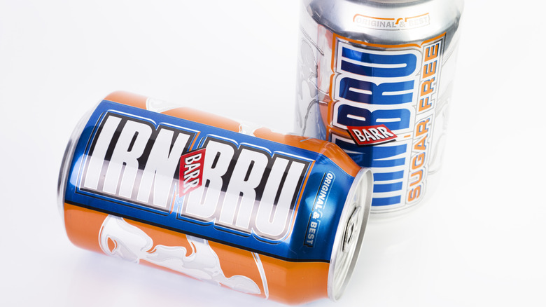 two cans of irn-bru on white background