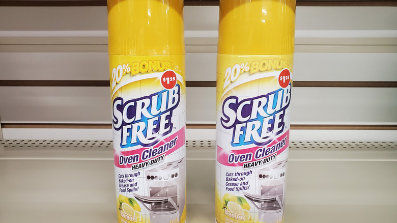 Two bottles of oven cleaner on a shelf at Dollar Tree