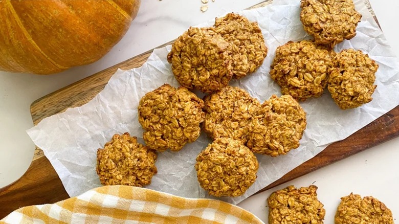 Pumpkin cookies on a wooden platter