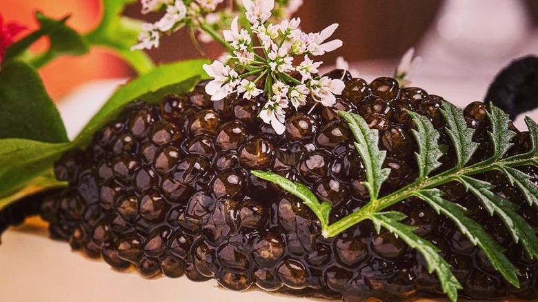 Caviar with flower garnish