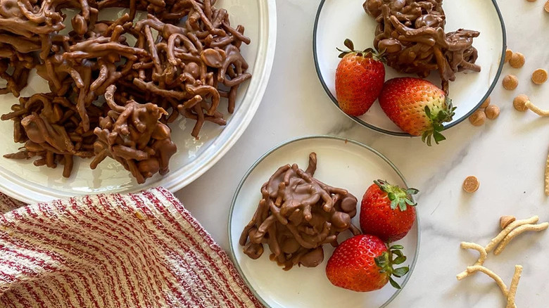 Chocolate haystacks on white plate