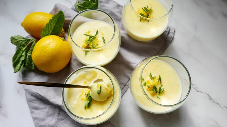 Lemon posset on table with fruit