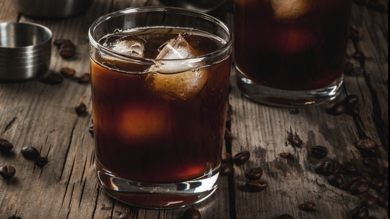 Close-up of a Black Russian cocktail with coffee beans