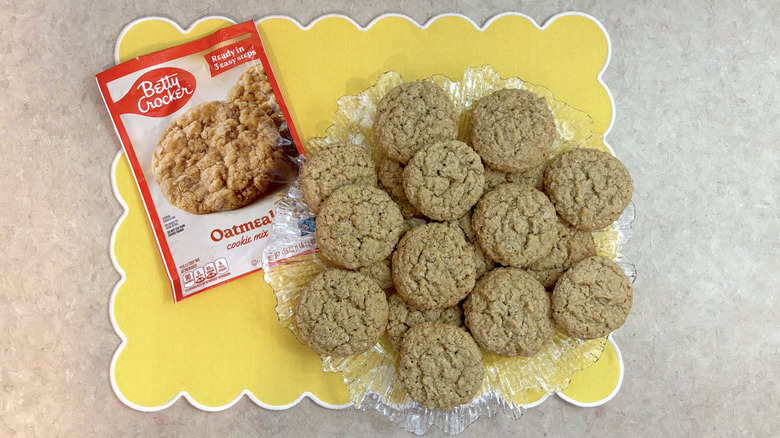 Betty Crocker oatmeal cookies on clear platter on yellow placemat