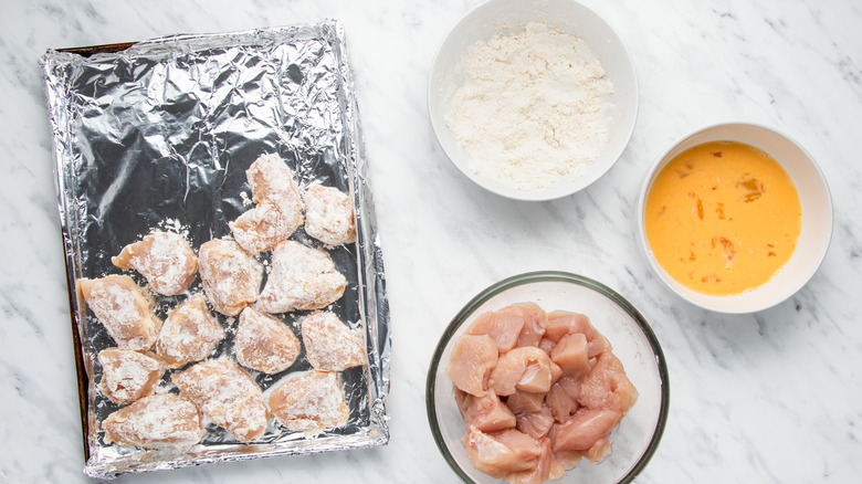 coating chicken in eggs flour