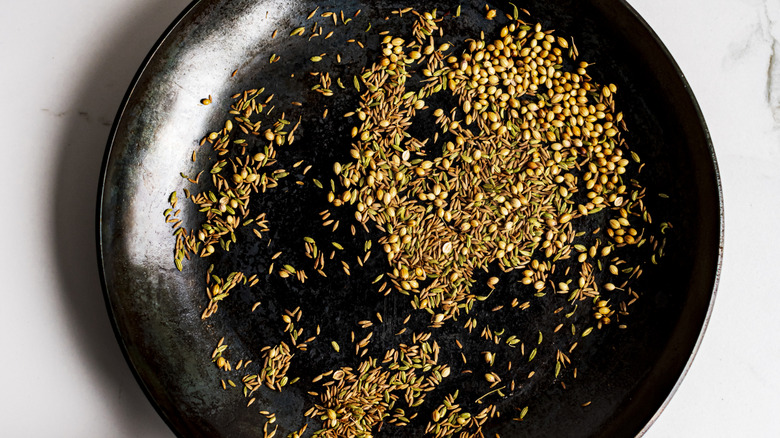 cumin seeds in a pan