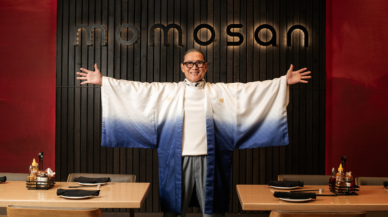 Chef Morimoto arms outstretched at Momosan Foxwoods