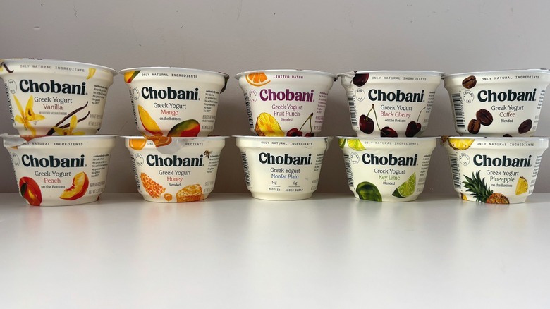 Ten Chobani yogurt flavors on white table