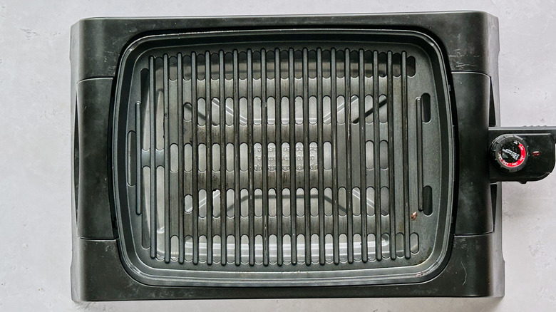 grill preheating on table