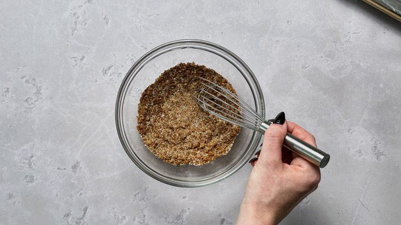 stirring seasonings together
