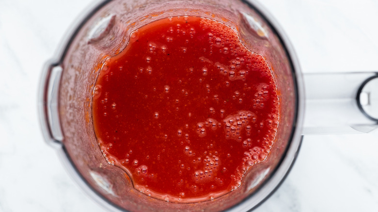 bubbly red liquid in blender