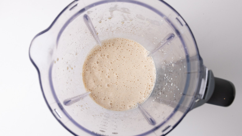 milkshake ingredients mixed in blender