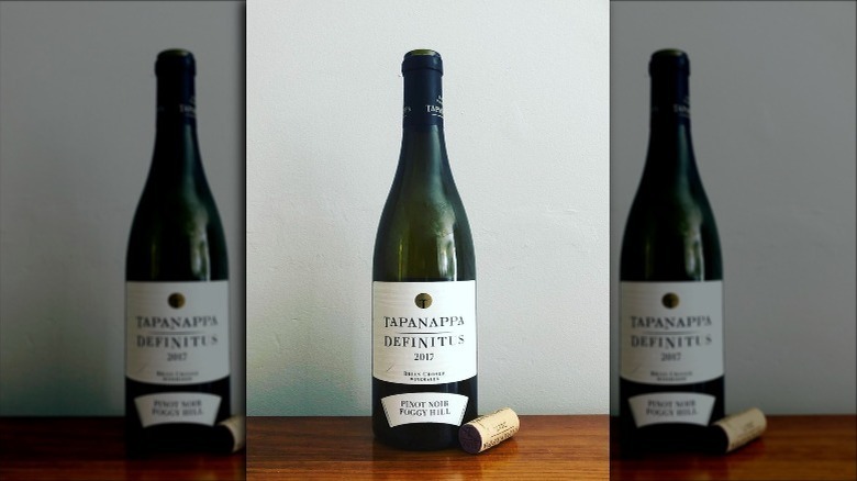 uncorked bootle of Pinot Noir
