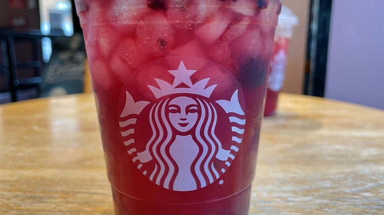 Close-up view of the Starbucks Blackberry Sage Refresher on a table