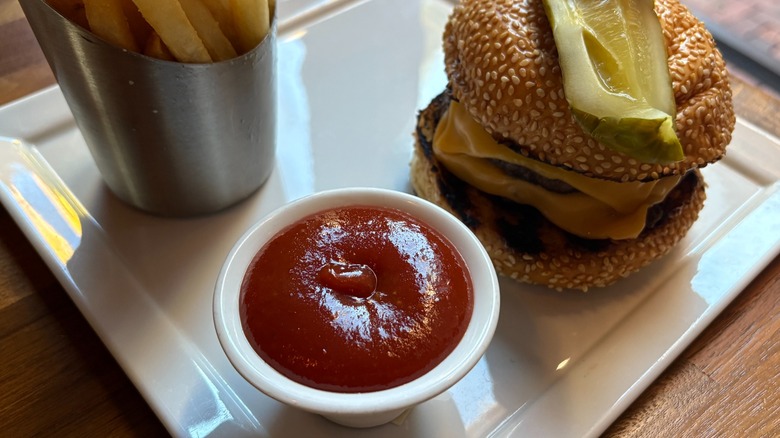 A cheeseburger with french fries