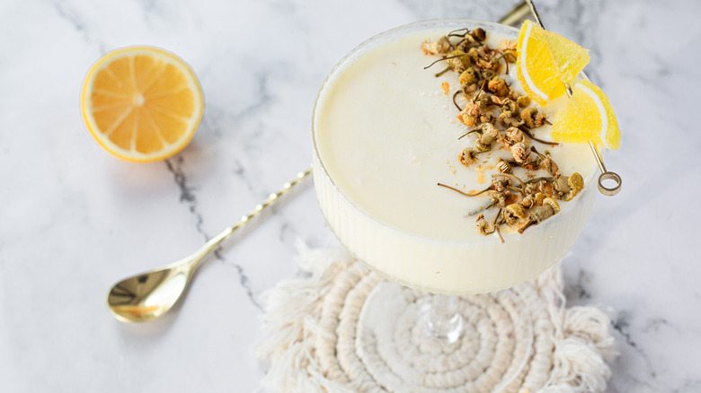lemon sunshine cocktail in coupe glass