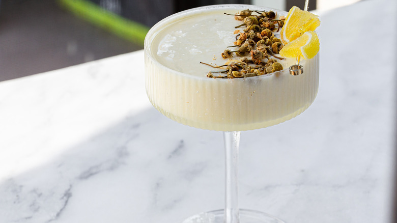 drink on marble counter with window in background