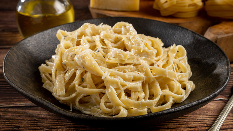 Bowl of pasta and Alfredo sauce