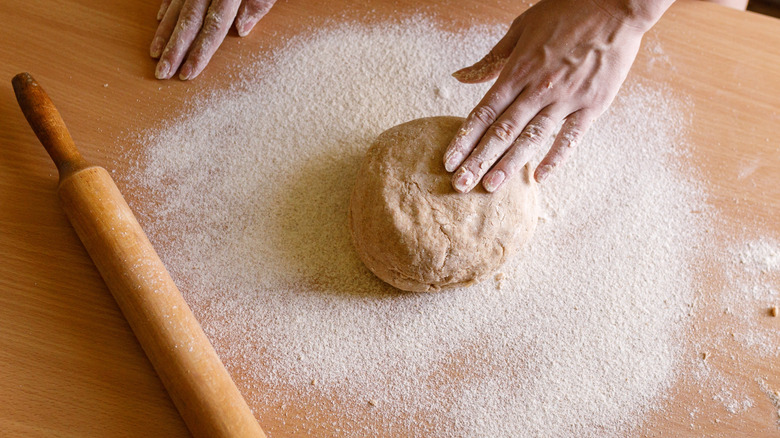 flour and dough on countertop