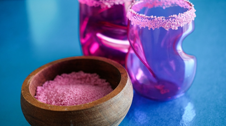 rimming glasses with pink sugar