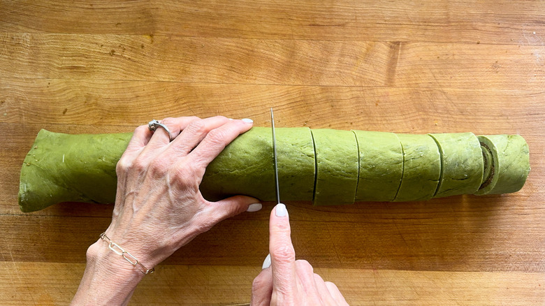 hand slicing dough