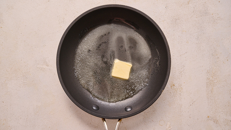 melting butter in skillet