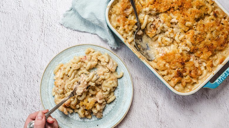 Lobster mac and cheese on plate and in casserole dish