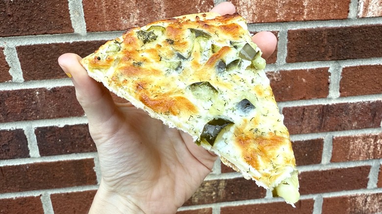 A slice of California Pizza Kitchen Dill Pickle frozen pizza