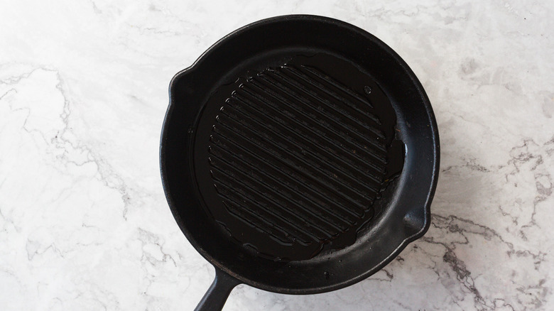 Olive oil in cast iron skillet