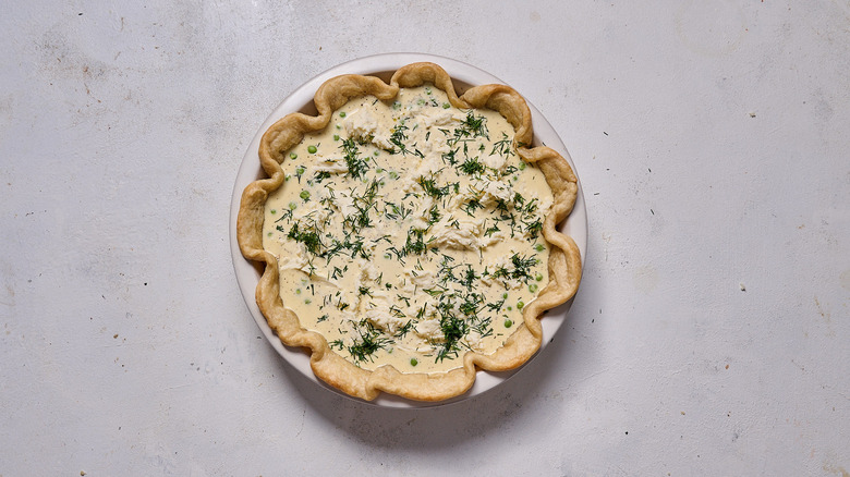 egg filling in quiche on table
