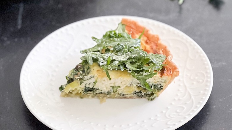 slice of quiche on plate
