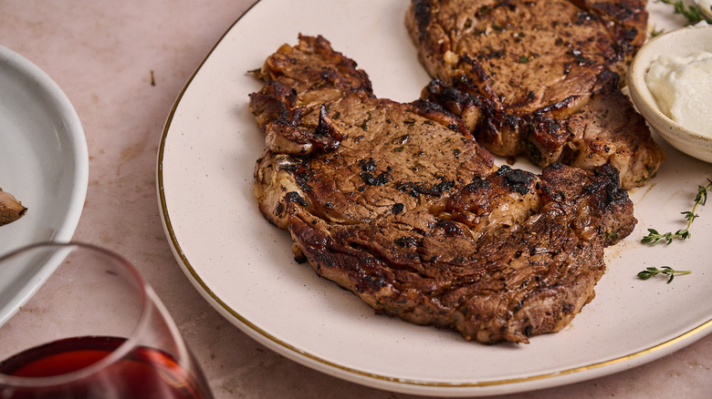seared delmonico steaks on plate
