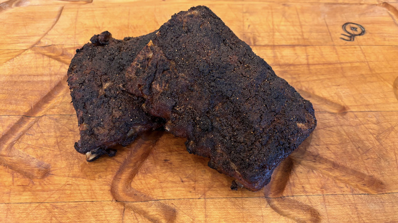 Chili's dry rubbed baby back ribs on wooden cutting board