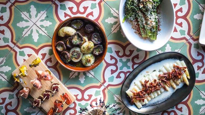 Plates of food on tile