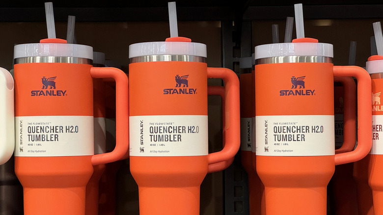 Stanley tumblers on shelf