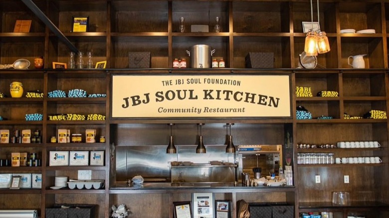 Shelves and the kitchen window inside restaurant JBJ Soul Kitchen