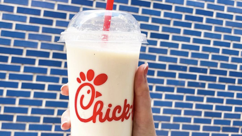 Person holding a Chick-fil-A frosted lemonade