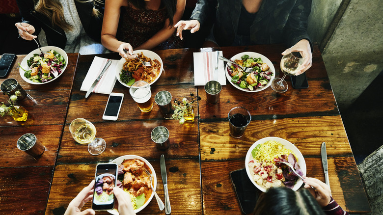Overhead view of people having dinner together